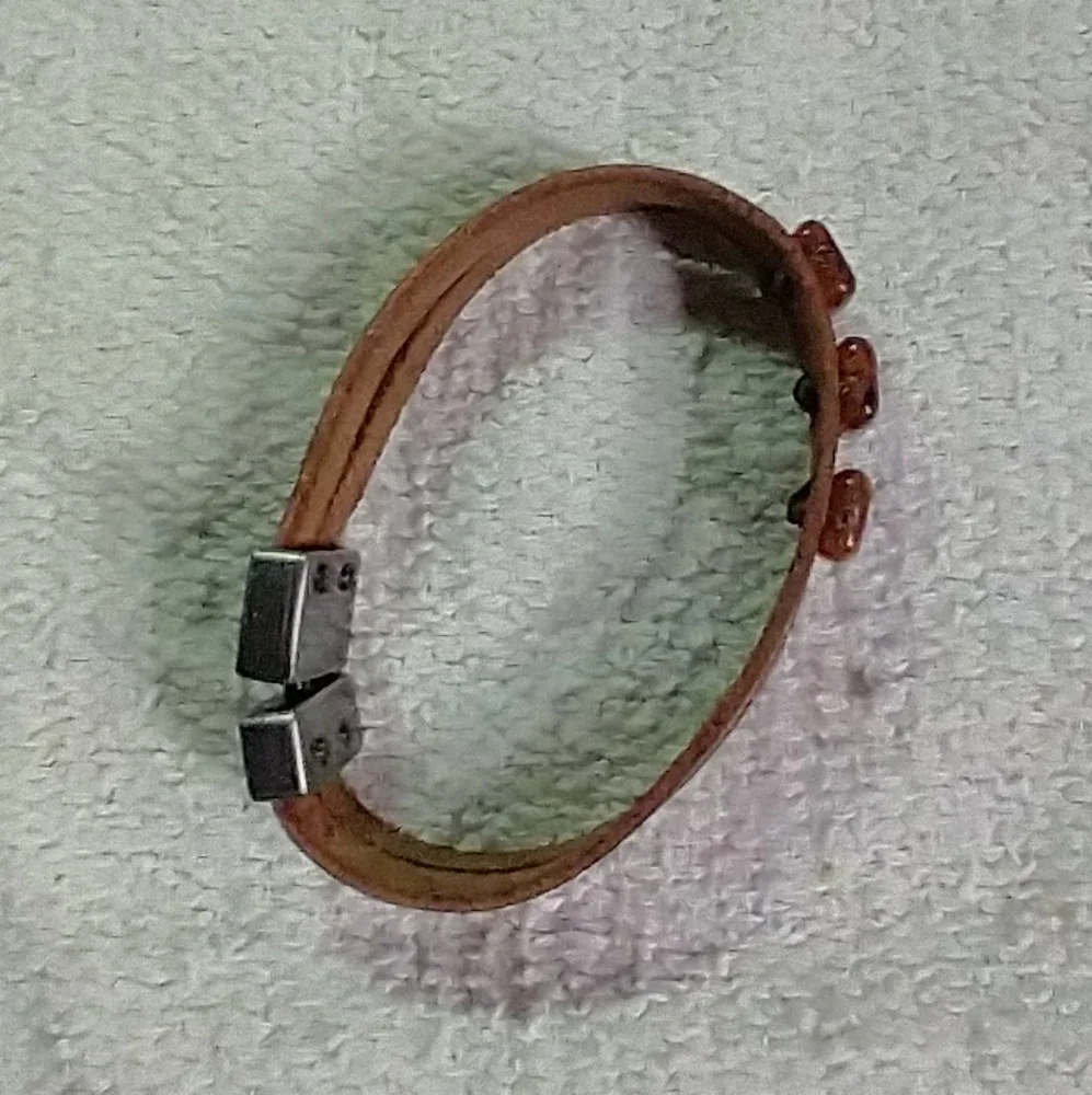 Silvertone faux amber brown leather bracelet